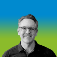 Co-founder and Head of Growth, Patrick McGowan's headshot with a blue and green gradient background